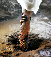 Jesus pulling someone from the mud